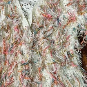 Cozy shaggy sweater. Cream with pink, blue and gold fringe. Oversized